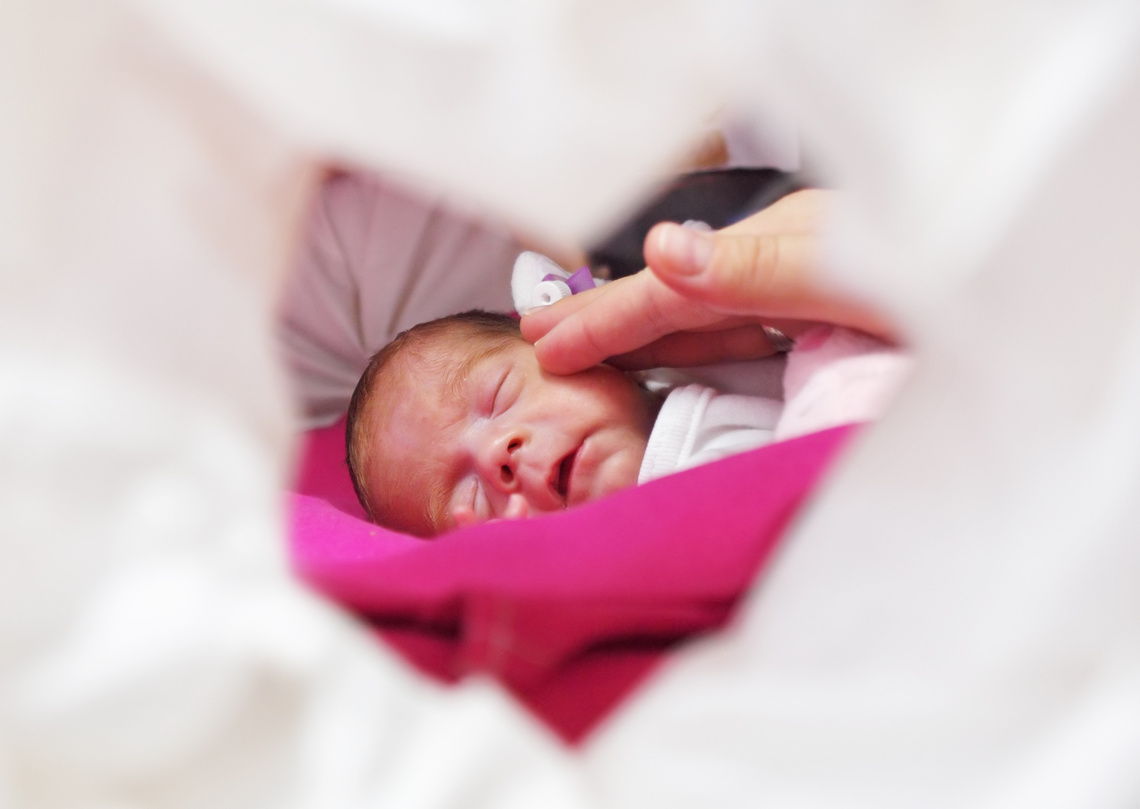 Premature baby in incubator